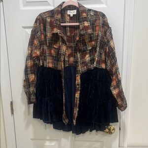 Oli & Hali Plaid and Blue velvet bottom flannel shirt. It’s an oversized fit.